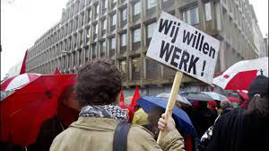 Foto demonstratie met bord Wij Willen Werk