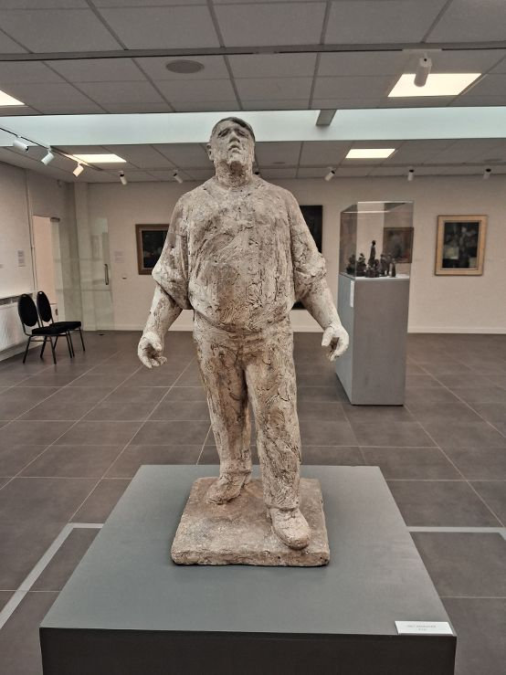 Foto Dokwerker op tentoonstelling