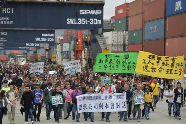 Foto stakende havenarbeiders